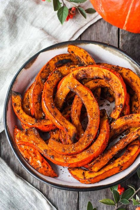 Tender and delicious Roasted Red Kuri Squash baked with an ancho chili powder -maple rub.  A perfect fall and winter side dish.  Easy to make with very little hands-on time. Vegan and Gluten-free. Kuri Squash Recipe, Red Kuri Squash, Winter Side Dishes, Autumn Side Dishes, Ancho Chili Powder, Baked Squash, Ancho Chili, Vegetarian Side Dishes, Vegan Side Dishes