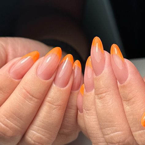 Learn the top trending orange French tip nail designs, how to DIY step by step, and the best occasions to rock this mega fun style! Click the article link for more photos and inspiration like this // Photo Credit: Instagram @lomelinails // #frenchtip #frenchtipcoffinnaildesigns #frenchtipcoffinnails #frenchtipcoffinnailsideas #frenchtipnailcolor #frenchtipnailpolish #frenchtipnails #frenchtipnailstyles Orange Coffin Shape Nails, Orange Tip French Nails, Orange Glitter French Tip Nails, French Tips Orange, Nails For Fair Skin, Orange Nails French Tip, Orange Tip Nails, Orange French Nails, Orange French Tip Nails