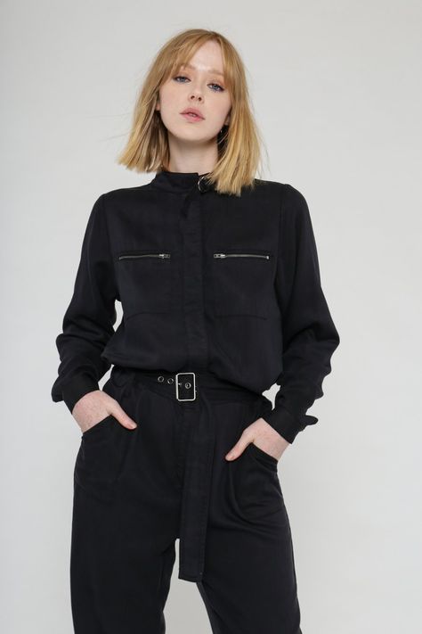 Black sustainable boiler suit with button through front and gun metal hardware. Featuring patched chest pockets with zips, large side pockets, back pockets and collar with D-rings closure. Long sleeves, belt, dropped crotch and ankle grazing leg length. Made from a soft eco-friendly Tencel. Size S-L. Utility Style, Boiler Suit, D Rings, Ethical Clothing, Black Beauty, Metal Hardware, Ethical Fashion, Fast Fashion, Winter Wardrobe