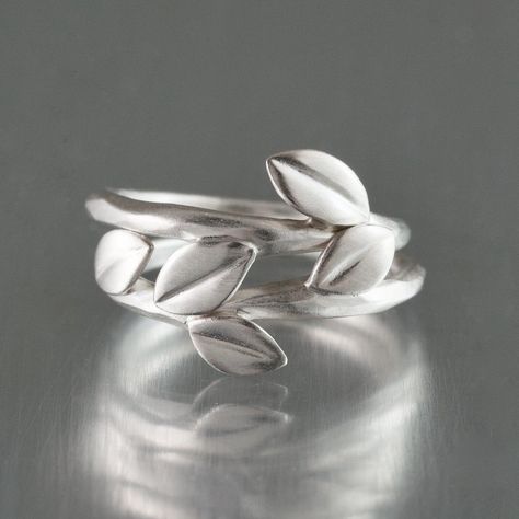 Silver Ring - This set includes the artists Triple Leaf and Double Leaf rings. Two or three opposing small leaves sprout from a subtly textured band. Crafted in sterling silver. Made to order in whole, half and quarter sizes 4-10. Leaf Rings, Small Leaves, Small Leaf, Leaf Ring, Ring Stacking, Stacking Rings, Precious Metals, Silver Ring, Jewelry Rings