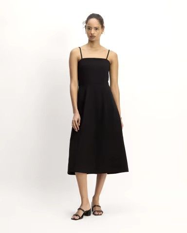 Discover the ultimate versatility with The Dream Everywhere Dress in Black. This must-have wardrobe staple effortlessly transitions from day to night, featuring a flattering silhouette and soft, breathable fabric. Perfect for casual outings or elegant events, it's a go-to piece for every occasion. Shop now to elevate your style with timeless elegance! Clothing Wishlist, Travel Outfits, Black Tank Dress, New Rock, Spaghetti Strap Dresses, Men's Sweatpants, The Dream, Everyday Style, Travel Outfit