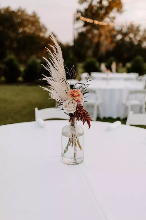 48 Centerpiece Ideas for Any Wedding Style Western Wedding Centerpieces, Western Centerpieces, Boho Centerpiece, Wedding Table Decorations Centerpieces, Boho Wedding Centerpieces, Boho Wedding Decorations, Wedding Table Decorations, Western Wedding, Wedding Table Centerpieces