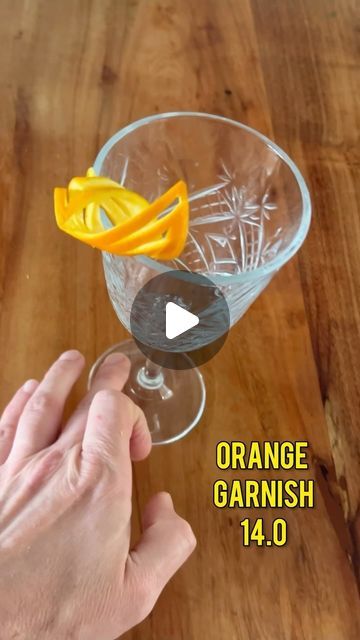 Björn van Tricht on Instagram: "Orange Garnish 14.0 😮
.
.
#cocktailgarnish #garnishing #cocktailtime #bartenderstyle #bartendingschool #bartender #cocktailshaker #bartenderprofesional #barlife #mixologie #cocktails #mocktail" Orange Garnish, April 21, Cocktail Shaker, Food And Drink, Bar, Orange, Van, On Instagram, Instagram