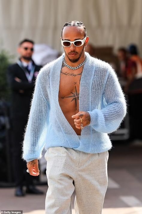 Lewis Hamilton bares his sculpted torso in a knitted blue cardigan as he walks the paddock ahead of the F1 Grand Prix in Monaco | Daily Mail Online Hamilton Outfits, F1 Lewis Hamilton, Blue Trainers, Stylish Celebrities, Quirky Fashion, Blue Cardigan, One Star, Lewis Hamilton, Formula One