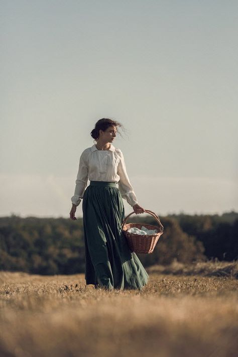 Magdalena Russocka historical woman carrying basket walking in field Circe Painting, Woman Laying In Field, Woman Carrying Basket, Woman Carrying Basket On Head, Girl In Field Aesthetic, Woman In Flower Field, Cottagecore Running In Field, 1900s Aesthetic, Woman Walking