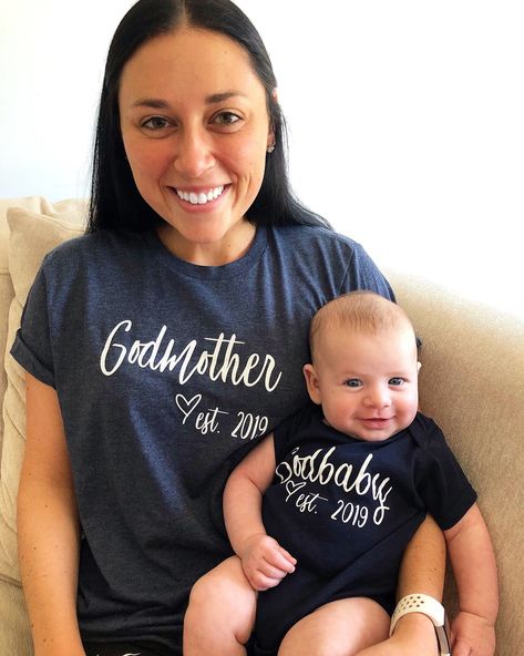 "Godmother Est (year) and Godbaby Est (year) Set. Welcome to Momaste Clothing Etsy Shop! This listing is for ONE (1) Unisex Cotton/Poly Shirt that says \"Godmother Est. (year)\" and ONE (1) bodysuit OR toddler tee that says \"Godbaby Est (year)\". Please leave a note at checkout with the shirt color you want for the adult shirt. If you also want a Godfather Est shirt, please message us! *Unisex runs longer, as it is a mens tee..we prefer this fit personally! *Super soft cotton/poly material ADUL Godmother Outfit, Godparent Request Ideas, Godmother Gifts Baptisms, Gift For Godmother, God Baby, Godmother Shirts, Godson Gifts, Goddaughter Gifts, Baptism Outfit