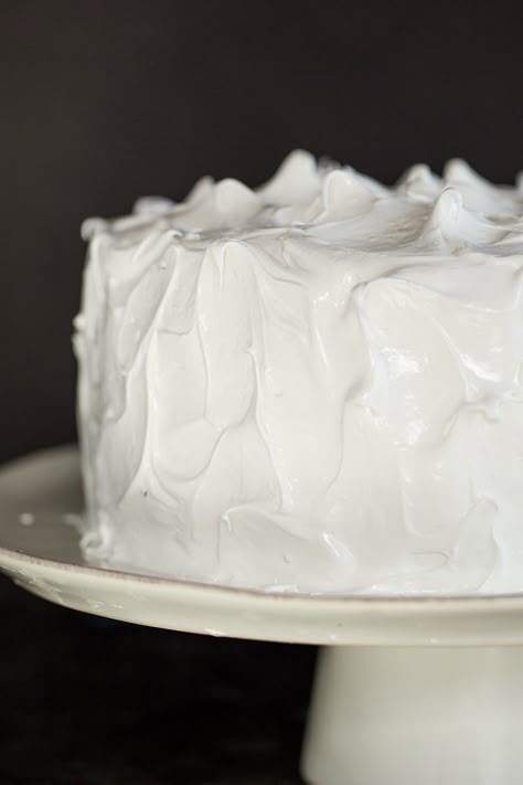 A devil's food cake covered in seven minute frosting on a cake stand. 7 Min Frosting, Angel Food Cake Frosting, Seven Minute Frosting, 7 Minute Frosting, Brown Eyed Baker, Marshmallow Frosting, Cake Frosting Recipe, Icing Frosting, Devils Food Cake