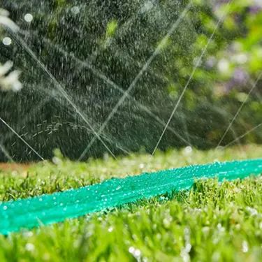 Create a Backyard Cool-Down Station Both Kids and Adults Will Love Drip Hose, Sprinkler Hose, Lawn Irrigation, Garden Hose Reel, Sprinkler Heads, Soaker Hose, Water Sprinkler, Lawn Sprinklers, Garden Hoses