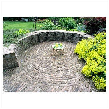 Circular patio with wall and brick paving  (Elke Borlowski photographer) Circular Patio, Brick Patio, Outdoor Paving, Brick Paving, Brick Garden, Garden Paving, Sunken Garden, Patio Wall, English Country Gardens