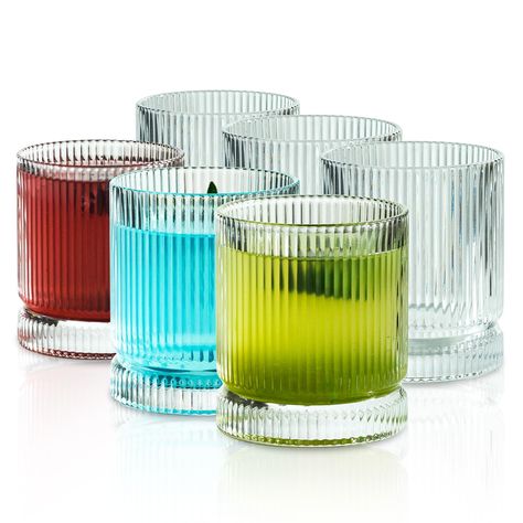 PRICES MAY VARY. [𝐄𝐋𝐄𝐆𝐀𝐍𝐓 𝐕𝐈𝐍𝐓𝐀𝐆𝐄 𝐆𝐋𝐀𝐒𝐒𝐖𝐀𝐑𝐄 𝐒𝐄𝐓] This set features 6 ribbed glass cups, each with a 13oz capacity, and a perfect size: Diameter - 3.2", Height - 3.74". The origami-style design adds charm, making them perfect for various beverages. Elevate your poolside drinks with these sophisticated cups. Cheers! [𝐃𝐔𝐑𝐀𝐁𝐋𝐄 & 𝐅𝐎𝐎𝐃-𝐆𝐑𝐀𝐃𝐄] Crafted from thick clear glass, these fluted glassware pieces are safe for food contact, and heat-resistant. They withs Fluted Glassware, Ribbed Cups, Mixed Glassware, Poolside Drinks, Coffee Beverages, Glass Cup Set, Glassware Drinking, Drinkware Sets, Cocktail Glassware