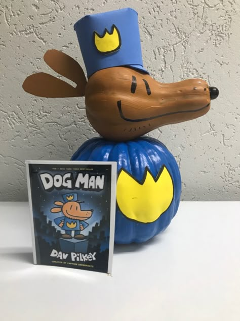 Dogman Pumpkin Book Report, Dogman Book Pumpkin, Book Character Pumpkins Dog Man, Pumpkin Contest Ideas No Carve Book Characters, Dogman Pumpkin Diy, Storybook Painted Pumpkins, Pumpkin Book Character Project, Diy Pumpkin Book Character, Painted Pumpkin Book Characters