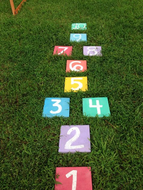 Paving stone hopscotch. I dug out the ground and laid the pavers so no stubbed toes Small Garden Play Area Ideas, Sustainable Playground, Garden Play Area Ideas, Garden Play Area, Play Area Ideas, Play Area Garden, Kids Outdoor Playground, Preschool Designs, Kids Backyard Playground