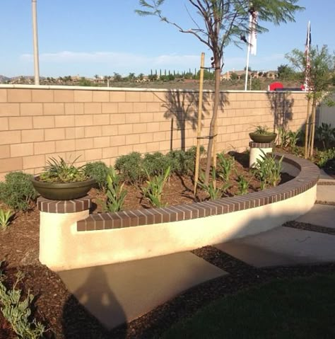 Stucco seat wall Stucco Seating Wall, Tucson Garden, Landscaping Porch, Port Charlotte Florida, Garden Log Cabins, Stucco Wall, Seat Wall, Retaining Wall Design, Driveway Patio