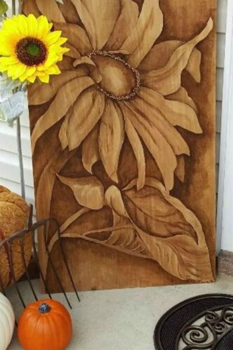 Just like drawing on paper with charcoal, painting with stain has its own quaint charm. Create a monochrome masterpiece on a free plank of wood that'll look gorgeous on display. Get the tutorial here. Fall Patio Decor, Stain Art, Fall Patio, Rustic Patio, Easy Diy Hacks, Gel Stain, Wood Stain, Sunflower Design, Into The Woods