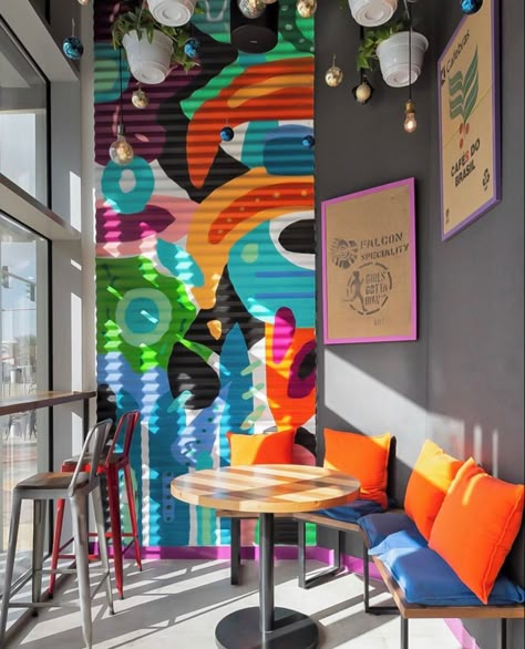 Caribbean Restaurant Design, Cafe Mural Ideas, Bar Murals, Rainbow Restaurant, Colourful Cafe, Funky Cafe, Colorful Cafe, Painted Walls, Retro Interior