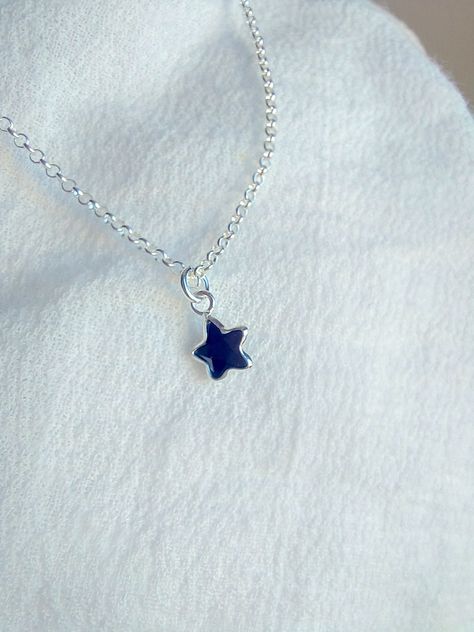 "Dainty and simple blue sapphire star necklace. Please choose your favorite necklace length at checkout. All lengths have a one inch extender, that way you'll have some wiggle room to play with the length. For example, if you choose a 14 inches necklace length, you'll have options to close the necklace at any length between 14 inches and 15 inches. Some of this charms are sold by themselves (no chain). If that option is available for this, you will have the option to buy \"CHARM ONLY\" before ad Blue Star Necklace, Blue Star Shaped Necklace For Gift, Blue Necklace With Star Charm As A Gift, Blue Sterling Silver Necklace With Star Charm, Blue Star Charm Necklace As A Gift, Blue Star Charm Necklace As Gift, Blue Star Charm Necklace For Gift, Blue Sterling Silver Star Of David Necklace, Dainty Blue Jewelry With Star Charm