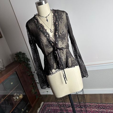 Vintage 90s 2000s sheer beaded lace ruffle extra long flare sleeve clasp bow tie front cardigan in like new condition. Size extra small but would fit someone small as well. Measurements: taken laying flat, chest 16.5”, waist 13”, hips 17.5”, sleeve 23”, length 19” and the fabric does have stretch #lacecardigan #fairy #cardigan #fairycore #2000s fairy core woodland y2k floral flower pattern grunge layering brown black fall inspo outfit jacket coat duster shirt cover up Black Lace Cardigan Outfit, Lace Cardigan Outfit, Fairy Cardigan, Duster Shirt, Black Lace Cardigan, Lace Outer, Sheer Cardigan, Tie Front Cardigan, Fall Inspo