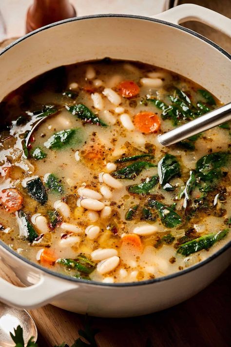 My Hearty Tuscan White Bean Soup is the only soup you need in your life, this Winter! It's full of delicious herbs and hearty white beans, to not only keep you full, but also satisfied! Plus, it's gluten-free and vegan, too. Prep this soup ahead of time or make it quickly when the craving strikes - destiny is in your hands! Tuscan White Bean Soup, Tuscan White Bean, Vegetarian Soup Recipes, Bean Soup Recipes, White Bean Soup, Vegetarian Soup, White Bean, Easy Soups, Easy Soup Recipes