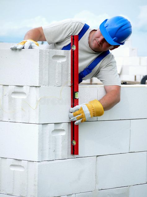 Mason at work. Mason checking plumb line of house wall being made from aerated a , #spon, #plumb, #line, #checking, #Mason, #work #ad Mason Work, Autoclaved Aerated Concrete, Aerated Concrete, Aac Blocks, Craftsman Style Bungalow, Concrete Block Walls, Decoration Beton, Masonry Work, Build A Wall