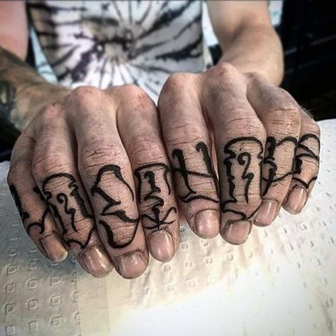 Man With Knuckle Tattoo Lettering Finger Tattoo Letter, Knuckles Tattoo, Finger Tattoos Words, Knuckle Tattoo, Letter Styles, Traditional Style Tattoo, Knuckle Tattoos, Riff Raff, Lettering Tattoo