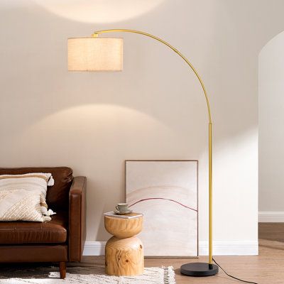 This arched floor lamp is manufactured with 78.4'' high, you will never worry about the short light. Furthermore, the arched base design makes the whole lamp modern and functional. The lamp could provide a warm and welcoming glow to your sapce after installed with a bulb. And you could control the lamp just by pressing its foot switch conveniently. | Mercer41 Gannicus 78.4" Arched Floor Lamp Metal in Brown / White / Yellow, Size 78.4 H x 32.0 W x 31.5 D in | Wayfair Arched Floor Lamp, Red Copper, House Inside, Arc Floor Lamps, Pedestal Dining Table, Swivel Armchair, Lighting Sale, Lamps Living Room, Drum Shade