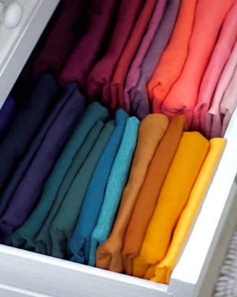 10 Drawer Hacks To Organize Your Whole Wardrobe | Apartment Therapy Dresser Clothing Organization, T Shirt Organization Dresser Drawers, Organize Tshirts In Drawer, Storing T Shirts, How To Organize Drawers Clothes, Legging Drawer Organization, Best Way To Organize Tshirts, Organizing Deep Dresser Drawers, Shirt Drawer Organization