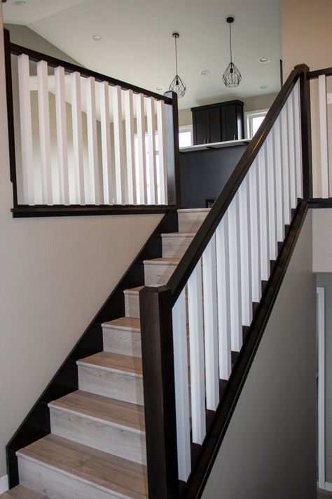 Black and White Stair Railing Black And White Banister Ideas, Black White Banister, Black And White Stair Banister, Modern Black Staircase, Black And White Railings For Stairs, Black Stairs Grey Walls, Black White Stairs, Black And White Staircase Ideas, Black White Staircase Banisters