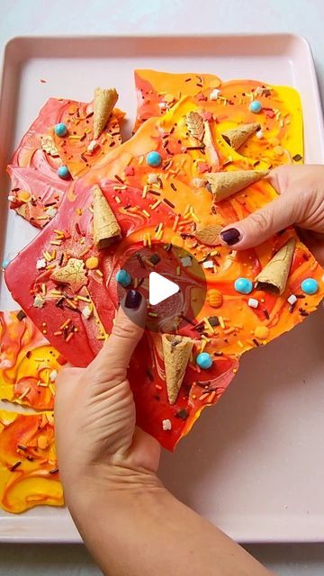 Sasha Aleksandra Nary on Instagram: "Autumn Chocolate Bark Recipe 🍁🍫🩵🍂 Follow @sashacakeschicago for more!✨️  Obsessed with these colors and the "mini - cornucopia" , what about you?🫠 Here is how to make it:  Ingredients:  Chocolate bars (mine are made with melted eleven o'one @stoverandcompany white chocolate that was tinted with oil-based food coloring gels (red, orange, yellow) and silicone chocolate bar molds by nycake ) Chocolate leaves Sprinkles Muddy Bites  Directions:  Set your chocolate bars on parchment paper placed over the baking pan. Heat in the oven on bake setting of 175°F for 10-12 minutes until melted.  Remove the pan from the oven and swirl the chocolate with an offset spatula or knife; add the sprinkles, chocolate leaves, and muddy bites - lightly pressing the large Muddy Bites, Autumn Chocolate, Chocolate Leaves, Offset Spatula, Oil Based Food Coloring, Candy Melt, Chocolate Bark Recipe, Chocolate Bar Molds, Bark Recipe