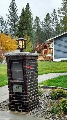 Dark brick mailbox DIY project, lighted, red flag, locked mailbox designed and built by Mac Anderson Modern Mailbox Brick, Brick Mailbox Diy, Red Brick Mailbox Ideas, Brick Mailbox With Light, Built In Mailbox Ideas, French Drain Ideas, Brick Mailbox Ideas, Mailbox Inspiration, Small Front Yard Ideas