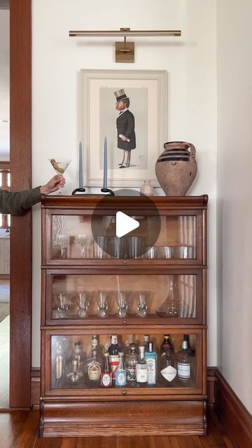 STEF TURNER on Instagram: "Ta-da ✨🍸
The barrister bookcase turned cocktail cabinet did not disappoint! And the stained oak looks like it was made for this space 🫶🏻- Who’s coming over for a drink? 💃 🥂 

#barcartstyling #barcart #bannisterbookcase #cornersofmyhome #cottagecore #cottagecoreaesthetic #countrykitchen #diningroomdecor #myeclectichome #myeclecticmix #liquorcabinet #cabinetstyling #countryliving #myhomevibe #loveyourhabitat #vintagestyle #vintagefurniture" Barrister Bookcase Decor, Barrister Bookcase Styling, Barrister Bookcase Makeover, Stef Turner, Bookcase Bar, Barrister Bookcase, Bar Cart Styling, Bookcase Styling, Bookcase Decor