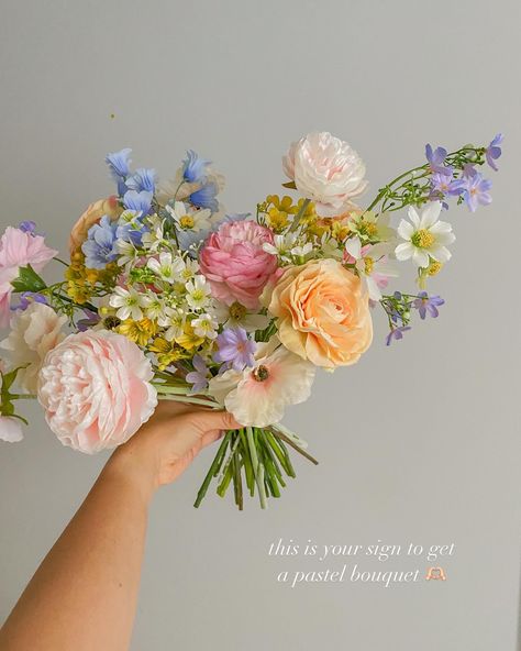 summer pastel bouquets are a must 🌷🧚🏻 Simple Pastel Bouquet, Spring Pastel Bridal Bouquet, Spring Bridesmaids Bouquets, Runuculous Flower Bouquet, Wedding Florals Pastel, Garden Party Bouquet, Whimsical Flower Bouquet, Garden Party Wedding Bouquet, Wildflower Wedding Theme Color Schemes