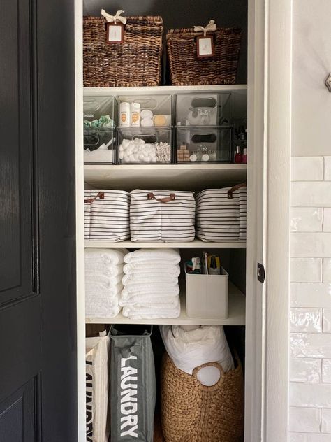 Categorize the Bathroom Closet: Maximize closet space by categorizing, labeling and organizing everything you own. Use large baskets for extra linens, clear bins for toiletries and color-coordinated hampers to make laundry day a breeze. See more at Bless'er House. Bathroom Closet Organization Ideas, Tiny Closet Organization, Hanging Bathroom Shelves, Small Linen Closets, Bathroom Linen Closet, Bathroom Sink Organization, Beautiful Bathroom Decor, Bathroom Drawer Organization, Airing Cupboard