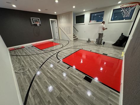 Check Out this amazing indoor mini basketball court in Chicago!  This court features our Maple Select surface, two mini hoops, and wall carpeting. From slam dunks to epic three-pointers, this compact court packs a punch of fun for the whole family. Who says you need a full-size court to shoot hoops like a pro? Get your game on with a custom court from Sport Court Midwest! Contact us at 630-350-8652 for a free estimate.  #Basketball #SportCourt #SportCourtMidwest 🏠🔥🏀 Indoor House Basketball Court, Small Indoor Basketball Court, Basement Basketball Court, Small Basketball Court Backyard, Basketball Court In House, Mini Basketball Court, Basketball Court Ideas, Basement Transformation, Indoor Sports Court