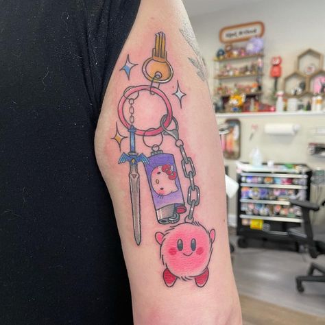 Claw Machine Tattoo, Keychain Tattoo Designs, Keychain Tattoo, Kirby Tattoo, Little Heart Tattoos, 90s Tattoos, Studio Ghibli Tattoo, Ghibli Tattoo, Pink Tattoo