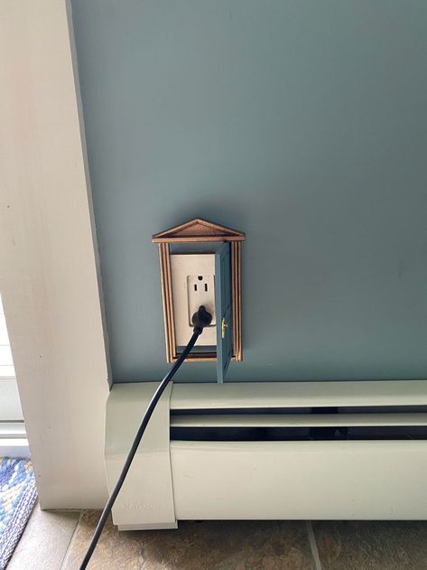 Woman Covers Electrical Outlets With Dollhouse Doors In Her Home And It Looks Magical Secret Hiding Spots, Dollhouse Door, Electrical Outlet Covers, Door Coverings, Creepy Decor, Outlet Plates, Dollhouse Projects, Hiding Spots, Fairy Doors