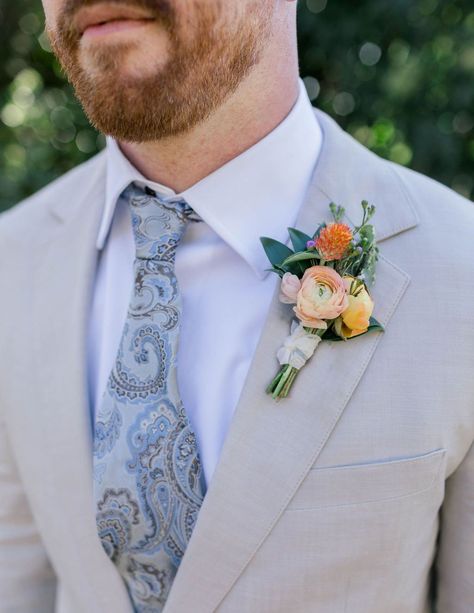 Outdoor garden wedding at private Italian-Inspired Villa. Nick wore the suit he wore in their 2020 elopement, paired with playful Nike sneakers. His boutonniere was created with Ranunculus, Gomphrena, Waxflower, and Butterfly Ranunculus Buds. Planning, Florals, and Design by Tyler Speier Events. Bouquets And Boutonnieres, Boutineer Ideas Wildflower, Wild Flower Wedding Boutonniere, Mens Boutineers Wedding Wildflower, Garden Style Boutonniere, Garden Rose Boutonniere, Wedding Bouquet And Boutonniere, Spring Flower Boutonniere, Garden Wedding Boutonniere