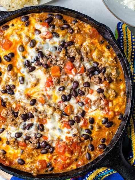 Easy Cheesy Ground Beef Enchilada Skillet Casserole Story - Life, Love, and Good Food Enchilada Skillet Recipe Ground Beef, Enchilada Skillet, Chilada Recipe, Ground Beef Enchilada Skillet, Beef Enchilada Skillet, Cheesy Enchilada Rice Skillet, Beef Enchilada Skillet Recipe, Healthy Enchilada Skillet Recipe, Chopped Enchilada Skillet Clean Food