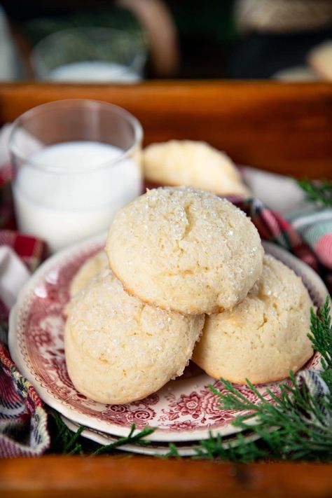 Amish drop sugar cookies are thick, puffy, soft, and coated in sparkling sugar! You can frost them, glaze them, or add sprinkles, too. Perfect for Christmas cookie trays and just about any other holiday celebration! Cookies With Buttermilk, Sugar Cookies With Sour Cream, Easy Drop Sugar Cookies, Cookies With Sour Cream, Drop Sugar Cookie Recipe, Sugar Cookies Soft, Christmas Cookie Trays, Amish Sugar Cookies, Sour Cream Cookies