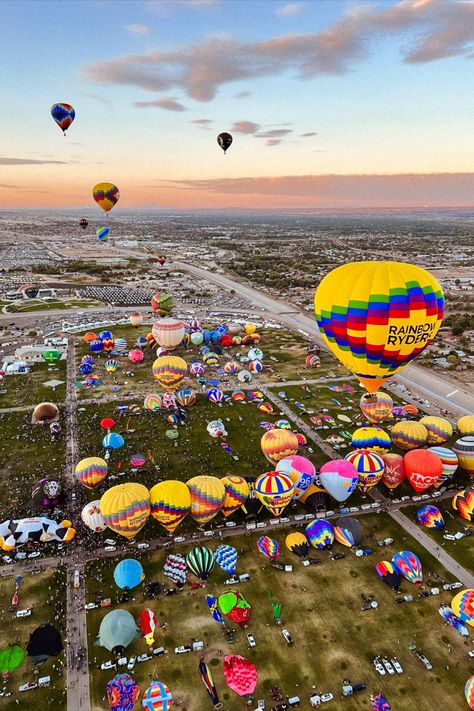 Take a hot air balloon ride at the Albuquerque International Balloon Fiesta! Join the mass ascension of about 600 balloons soaring over the skies of Albuquerque NM. Albuquerque Balloon Fiesta, Hot Air Balloon Ride, Air Balloon Festival, 50 Balloons, Hot Air Balloon Festival, Balloon Festival, Balloon Flights, Large Balloons, Hot Air Balloon Rides