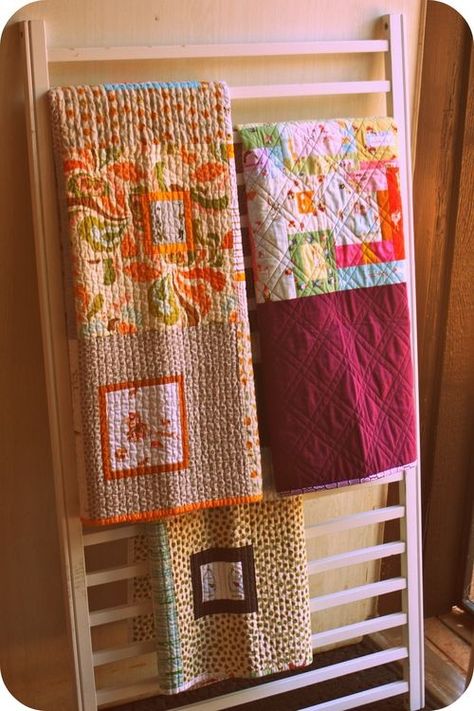 Repurposed crib slats as quilt rack :) My plan for Lilly's old drop side crib that has been taken apart. Old Crib Ideas, Quilt Rack Ideas, Repurposed Crib, Crib Repurpose, Quilt Display Ideas, Displaying Quilts, Old Baby Cribs, Quilt Racks, Old Cribs