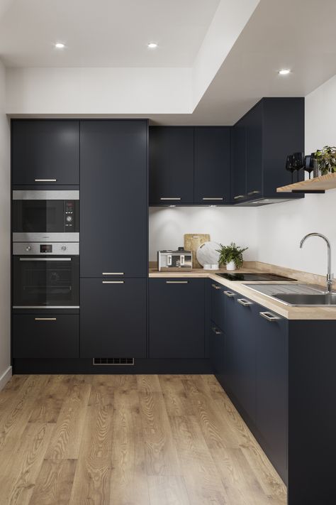 Embrace the trend for dark interiors with the bold shade of our Greenwich Navy kitchen cabinets. To create this bold kitchen design then pair with wood flooring for kitchen flooring ideas. With a slab design and matt finish the Greenwich range is perfect for a modern space. Navy Kitchen Cabinets, Stylish Small Kitchen, Blue Kitchen Designs, Серая Кухня, Navy Kitchen, Kitchen Decor Inspiration, Open Plan Kitchen Living Room, Blue Kitchen Cabinets, Kitchen Room Design