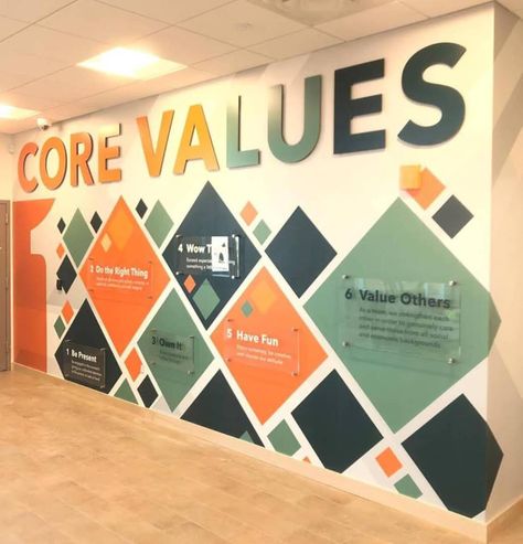 Corporate Wall Design Graphics, Construction Office Wall Design, Mural Office Wall, Core Values Wall Design, Corporate Values Wall, Corporate Wall Mural, Office Mural Ideas, Construction Office Interior Design, Office Wall Design Ideas Creative