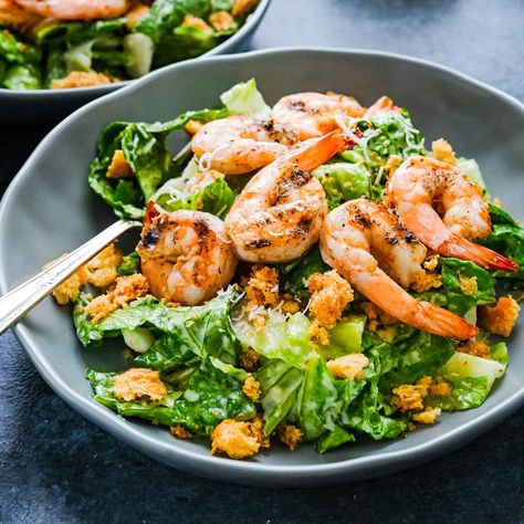 This Grilled Shrimp Caesar Salad recipe is the best if you love seafood and Caesar salads. Made with fresh shrimp seasoned with Old Bay seasoning and fresh romaine lettuce. You'll love the cheater's method of Caesar salad dressing and the crunchy croutons in every bite. Make the shrimp Caesar salad today. Cezar Salad, Shrimp Ceasar Salad, Best Grilled Shrimp, Grilled Shrimp Seasoning, Shrimp Caesar Salad, Caesar Salads, Creamy Caesar Dressing, Old Bay Shrimp, Spicy Grilled Shrimp