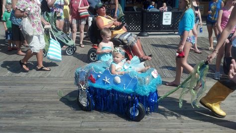 Little Mermaid in Kiddie parade at Point Pleasant Beach, NJ Under The Sea Wagon Decorations, Under The Sea Wagon Float, Ocean Wagon Halloween, Mermaid Wagon Halloween, Mermaid Wagon Float, Mermaid Parade Coney Island, Stroller Halloween Costumes, Ariel Halloween, Wagon Floats