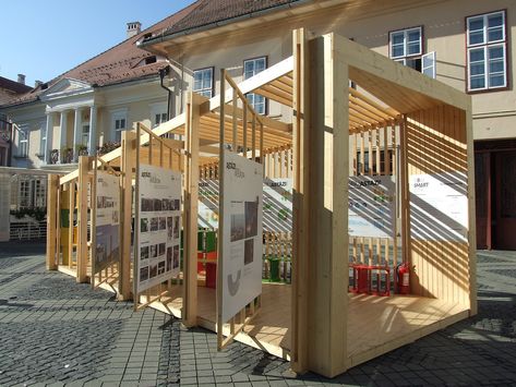 Image 1 of 21 of Urban TelesCOOP/Temporary Pavilion | COOP pe Strada | Temporary Building, Temporary Pavilion, Stall Design, Temporary Structures, Stall Designs, Cube Design, Building Design, Coop, Interior Design