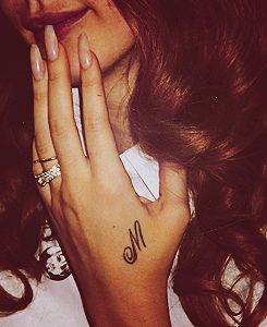 Lana Del Rey's tattoo. "M" for her grandma...I didn't realize that's what it stood for! How lovely! Gods And Monsters Tattoo, Monsters Tattoo, Lana Del Rey Tattoos, Gods And Monsters, M Tattoos, Letter M, Small Tattoo, Tattoo Placement, Piercing Tattoo