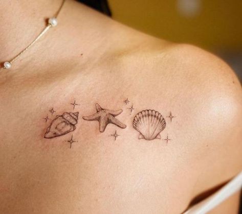 Scallop conch shells with starfish clavicle tattoo Clam Shell With Pearl Tattoo, Matching Seashell Tattoos, Starfish And Shell Tattoo, Sea Shell Tattoo Design, Seashell Tattoo Design, Starfish Tattoo Designs, Scallop Tattoo, Conch Tattoo, Sea Shells Tattoo Ideas