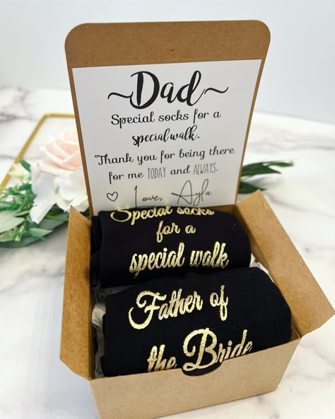 "This listing is for a pair of Black Father of the bride socks!  The socks are black and have the text \"Father of the bride\" on one sock and \"Special socks for a special walk\" on the other sock!  The text is in shiny gold lettering!  This includes a personalized card attached to a box (color of your choice!)" Gifts For Father Of Bride, Father Of Bride Suit, Father Of The Bride Attire, Wedding Cricut, Tiana Wedding, Father Of The Bride Gift, Western Themed Wedding, Bride Attire, Wedding Gifts For Parents