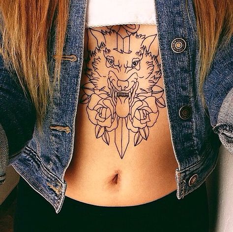 simple wolf tattoo. love it on the stomach Wolf Stomach Tattoo, Simple Wolf Tattoo, Tummy Tattoo, Stomach Tattoos Women, Stomach Tattoo, Knife Tattoo, Stomach Tattoos, Sternum Tattoo, Wolf Tattoos