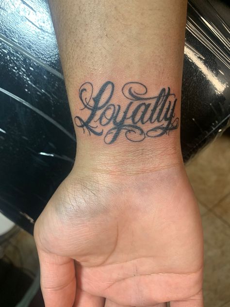 Loyalty Behind Ear Tattoo, Loyalty Tattoo Behind Ear, Loyalty Wrist Tattoo, Fear God Wrist Tattoo, Loyalty Arm Tattoo, Loyalty Over Love Tattoo For Men, Chosen Tattoo Words, Loyalty Face Tattoo, Loyalty Over Everything Tattoo